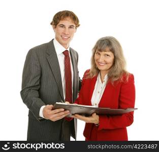 Attractive business team of mature businesswoman and young businessman. Isolated on white.
