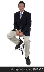 Attractive Businessman Sitting On Stool.