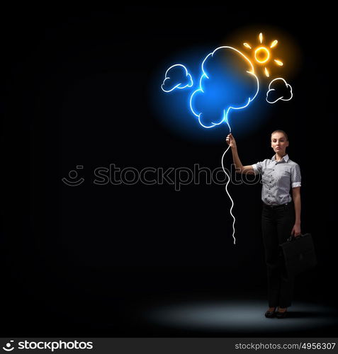 Attractive businesswoman. Image of attractive businesswoman against dark background with sun