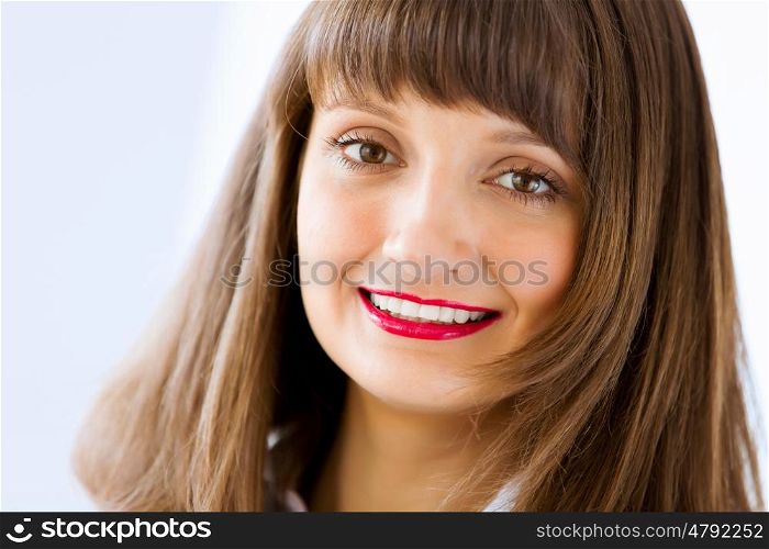Attractive businesswoman. Image of attractive successful businesswoman in business suit smiling