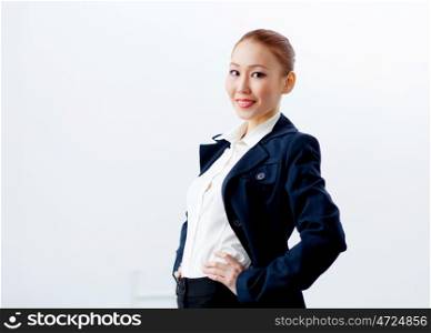 Attractive businesswoman in formal suit. Image of young asian businesswoman in formal suit