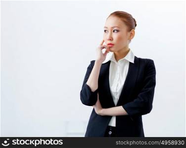 Attractive businesswoman in formal suit. Image of young asian businesswoman in formal suit