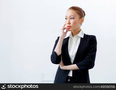 Attractive businesswoman in formal suit. Image of young asian businesswoman in formal suit