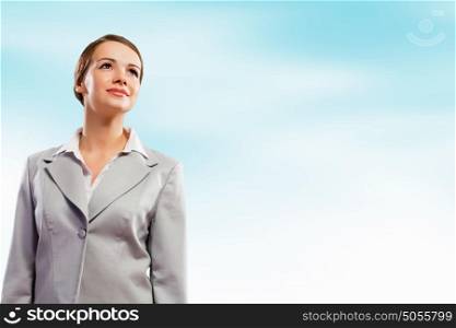 Attractive businesswoman in suit. Image of young attractive businesswoman in suit smiling
