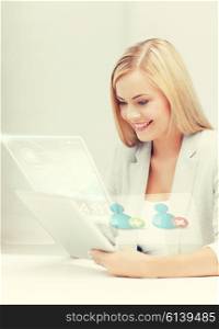 attractive businesswoman looking at tablet pc with contact icons. businesswoman looking at tablet pc