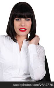 Attractive businesswoman wearing red lipstick