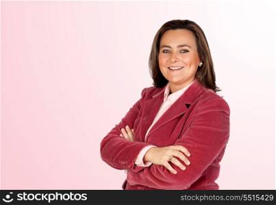 Attractive businesswoman with jacket isolated on pink background