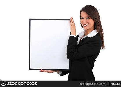 Attractive businesswoman with picture frame