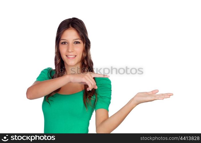 Attractive casual girl in green with the hand extended isolated on white