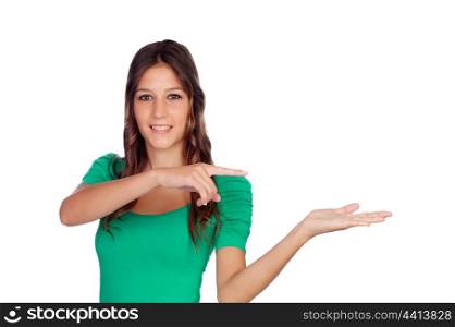 Attractive casual girl in green with the hand extended isolated on white