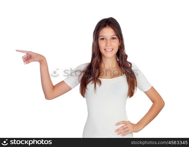 Attractive casual girl indicating at side something isolated on white