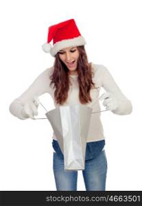 Attractive casual girl with Christmas hat shopping isolated on a white background