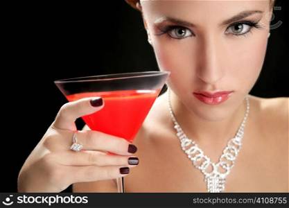Attractive cocktail woman with jewellery and martini red glass