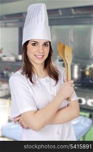 Attractive cook woman in the restaurant?s kitchen