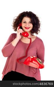 Attractive curvy girl calling with a red phone isolated on a white background