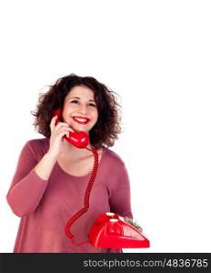 Attractive curvy girl calling with a red phone isolated on a white background