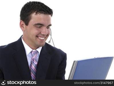 Attractive Customer Service Representative with headset and computer,