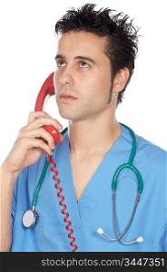 attractive doctor speaking on the telephone a over white background