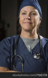 Attractive Female Doctor or Nurse Portrait Wearing Stethoscope.