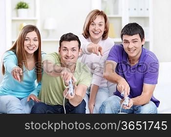 Attractive friends play video games