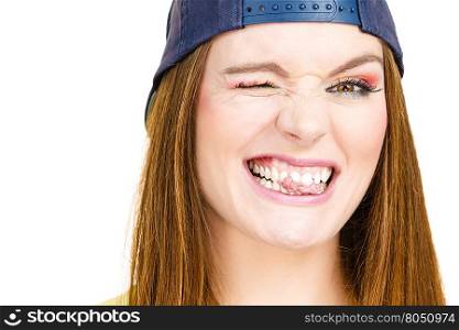 Attractive girl chewing gum.. Funky people concept. Attractive girl chewing gum. Young woman has beautiful colourful make up.