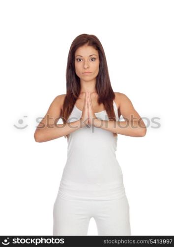 Attractive girl dressed in white practicing yoga isolated