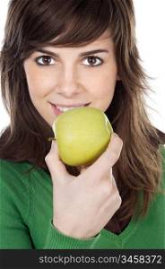 attractive girl eating a green apple a over white background