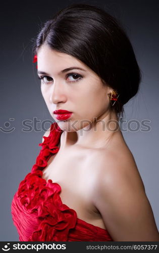 Attractive girl in red dress