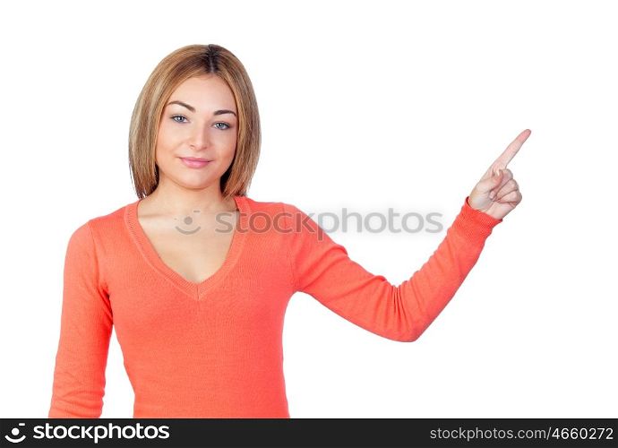 Attractive girl pointing to something isolated on white background