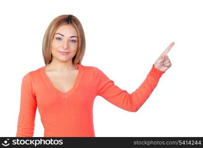 Attractive girl pointing to something isolated on white background