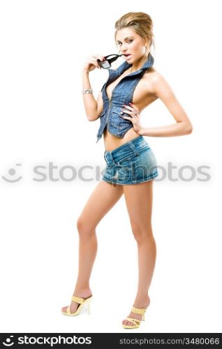 attractive girl posing in jeans outfit, isolated over white