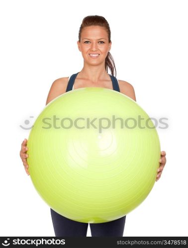 Attractive girl practicing pilates with a big green ball