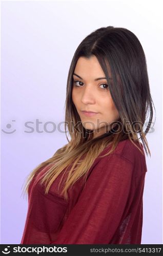 Attractive girl smiling isolated on a blue background