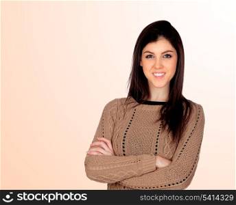 Attractive girl smiling isolated on a orange background