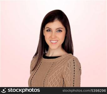 Attractive girl smiling isolated on a pink background