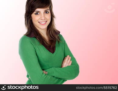 Attractive girl smiling with crossed arms isolated on pink background