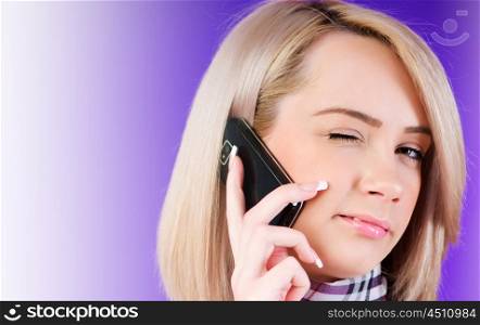 Attractive girl speaking on the mobile phone