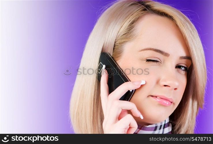 Attractive girl speaking on the mobile phone