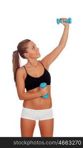 Attractive girl training with dumbbells isolated on a white background