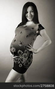 attractive girl waiting for child. studio shot