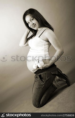 attractive girl waiting for child. studio shot