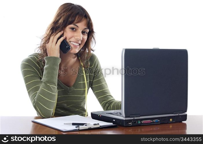 Attractive girl whit computer and telephone a over white background