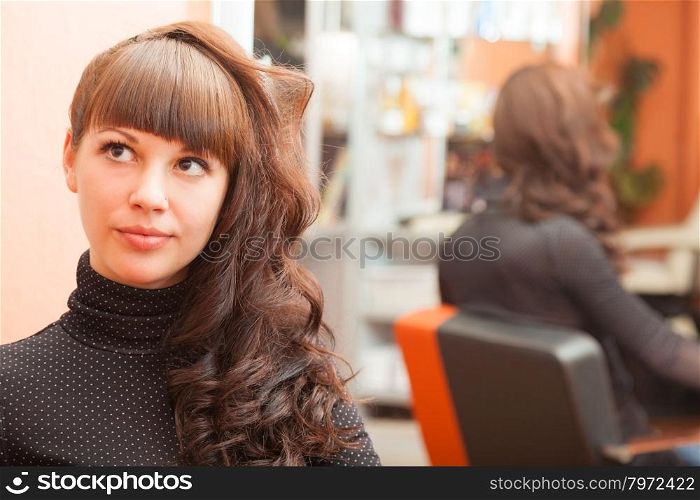 attractive girl with beautiful hair in the interior. portrait