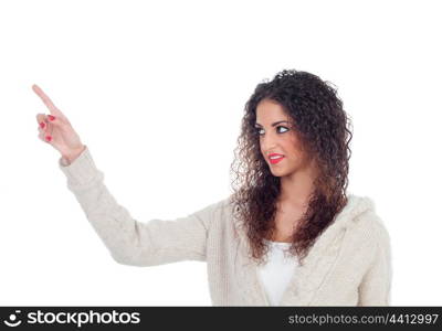 Attractive girl with big black eyes and the hand extended indicating something isolated on a white background