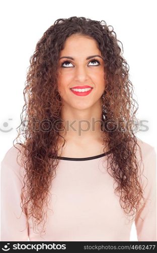Attractive girl with big black eyes looking up isolated on a white background