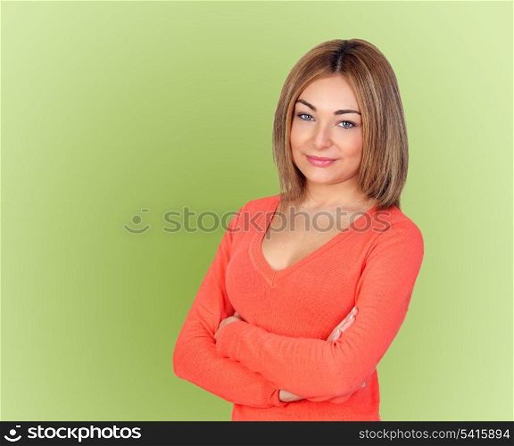 Attractive girl with blond hair isolated on green background