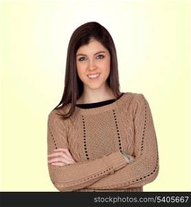 Attractive girl with crossed arms isolated on yellow background
