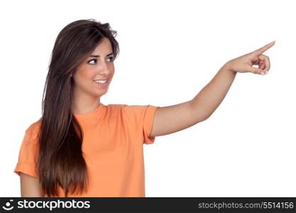 Attractive girl with long hair indicating something by hand isolated on white background