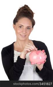 Attractive girl with money box insert coin a over white background
