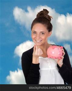 Attractive girl with money box with a blue sky of background